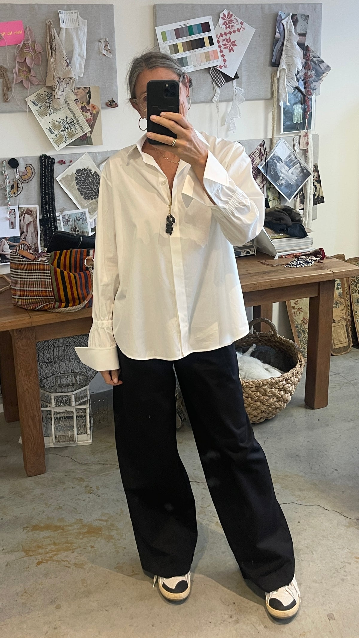 Bergen Blouse in white poplin, relaxed fit with double cuffs, styled with black trousers