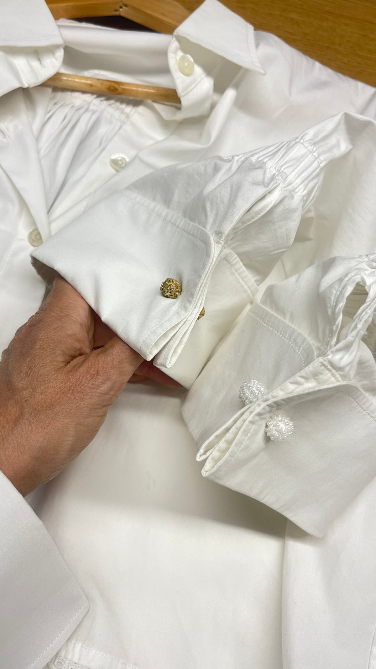 Bergen Blouse cuff details with decorative gold-coloured and white beaded cufflinks